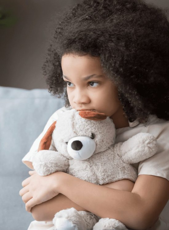 Smal Child with a toy bear